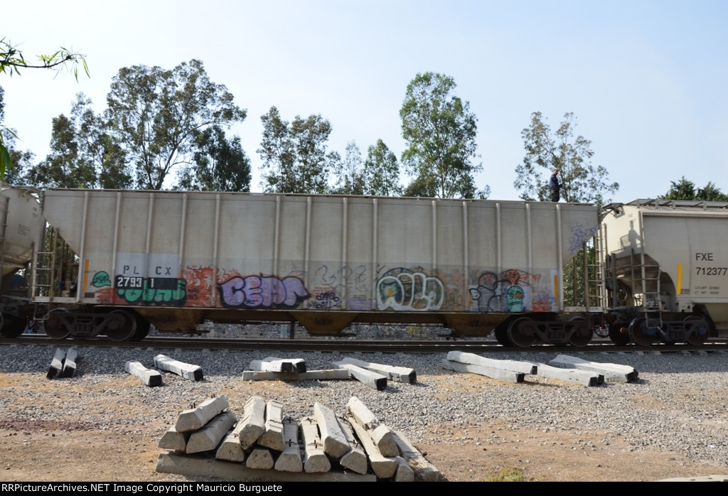 PLCX Covered Hopper with graffiti